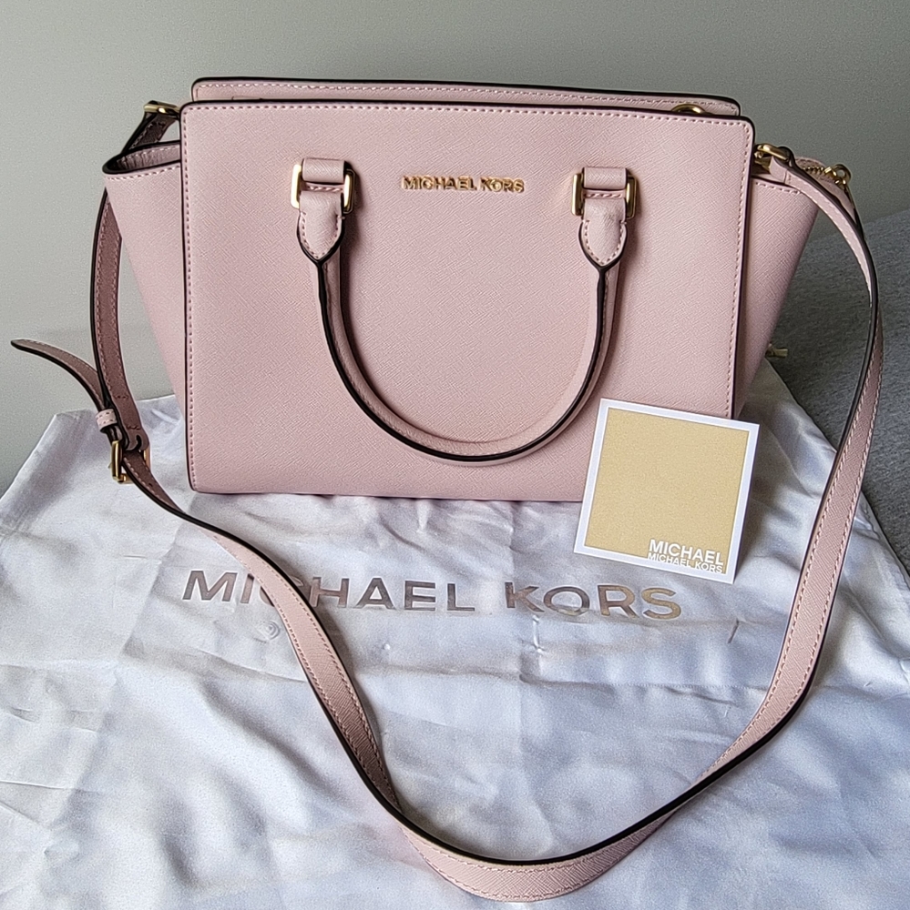 Micheal Kors Hand/Cross body bag